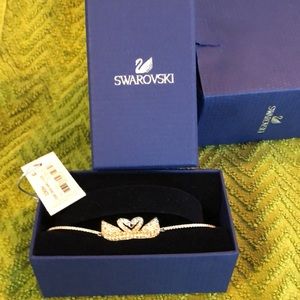 Swarovski iconic swan bangle..silver crystals on the top,bands, gold below